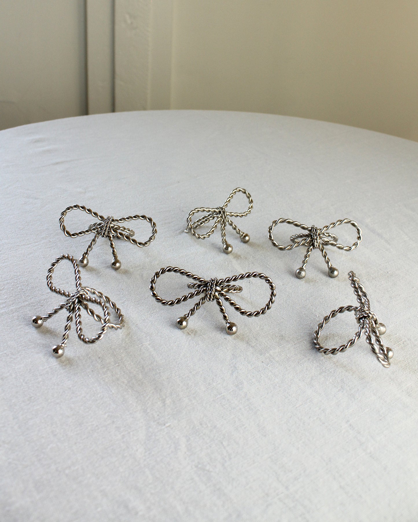 Vintage Silver Tone Twisted Bow Napkin Rings- all 6