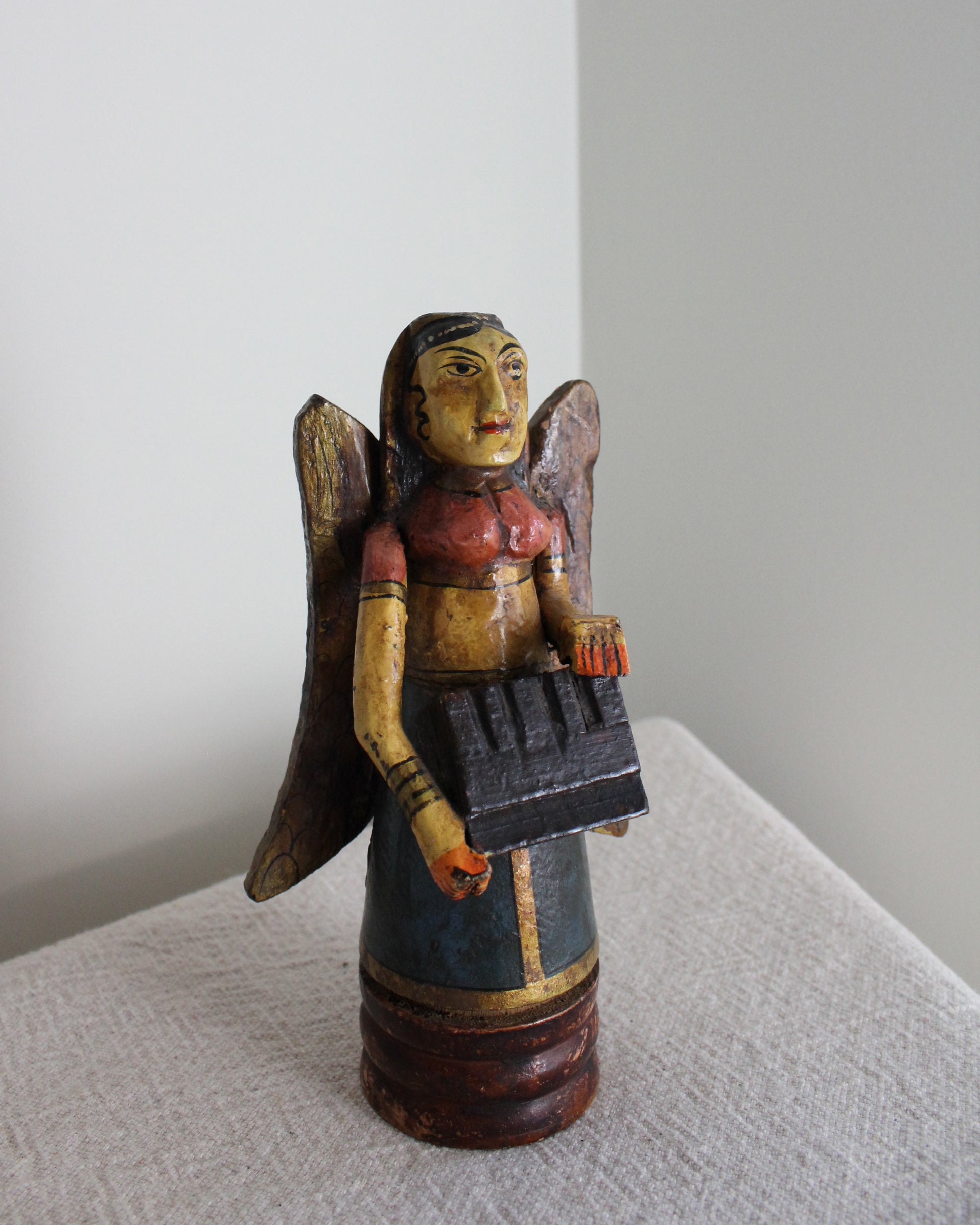 Vintage Hand Carved Angel Carrying Gifts