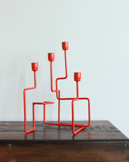 Red Candelabra on a wooden table